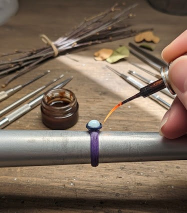 Nature’s Blueprint: Sculpting the Larimar Ring Through the Storm