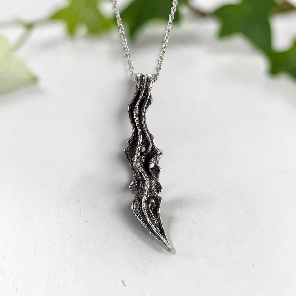 driftwood branch sterling silver pendant with oxidized finish to show wooden texture