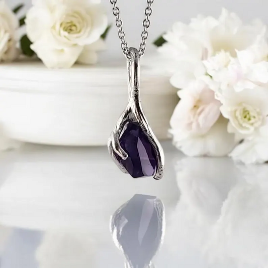 Hand-sculpted branch textured gold necklace with purple amethyst stone