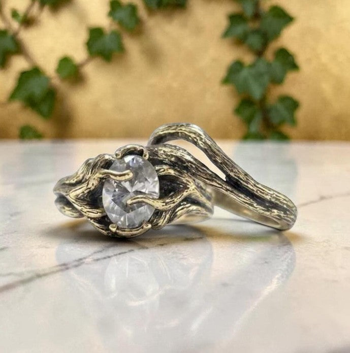 oval yellow gold vine style ring
