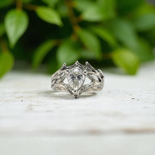 Pear-shaped Moissanite Engagement Ring