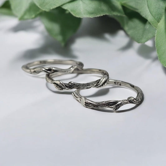 3 silver rings with vines and leaves locking together in a set of 3